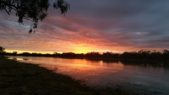 Sunrise over Georgina River, Camooweal.